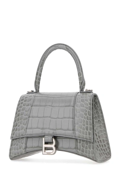 Shop Balenciaga Handbags. In Grey