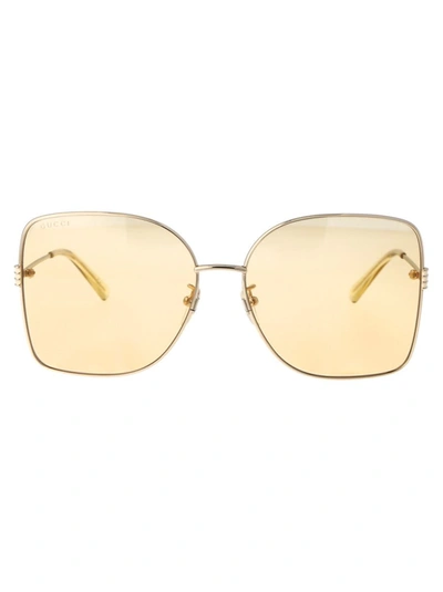 Shop Gucci Sunglasses In 005 Gold Gold Orange