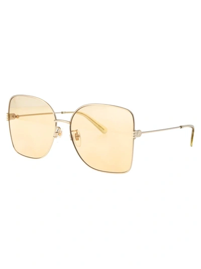 Shop Gucci Sunglasses In 005 Gold Gold Orange