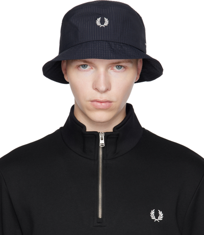 Shop Fred Perry Navy Dual Branded Bucket Hat
