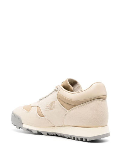 Shop New Balance Rainier Low Leather Sneakers In Neutrals