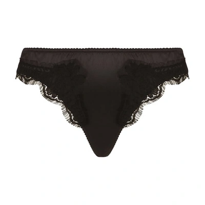 Shop Dolce & Gabbana Satin Thong With Lace Detailing In Black