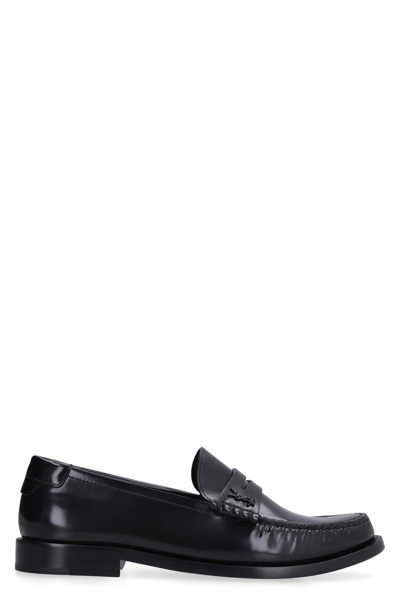 Shop Saint Laurent Leather Loafers In Black