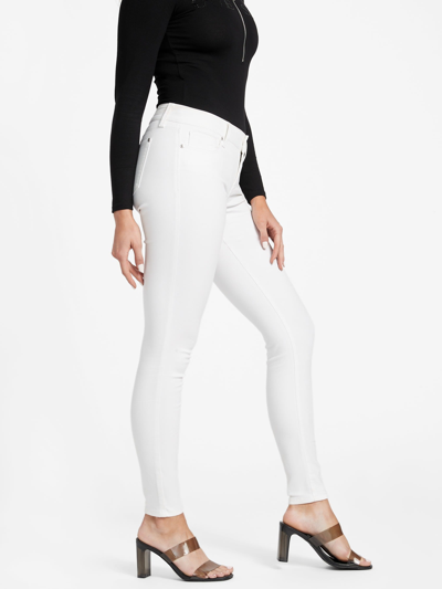 Shop Guess Factory Sienna Curvy Mid-rise Skinny Jeans In White