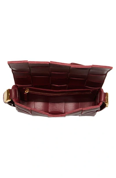 Shop Bottega Veneta Cassette Intrecciato Leather Crossbody Bag In Barolo-gold