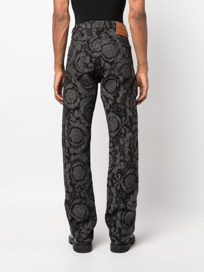 Shop Versace Barocco Silhouette Patterned Jeans In Grey