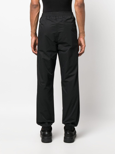 Shop Moncler Logo-patch Track Pants In Black
