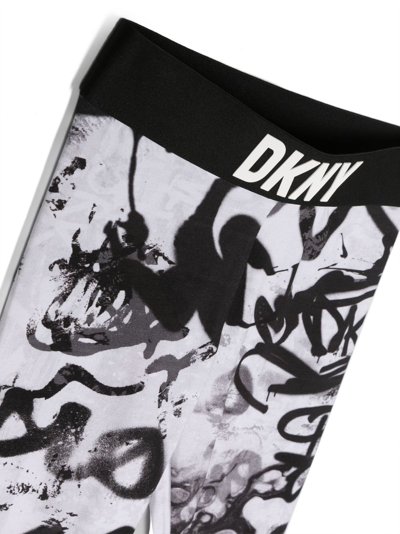 Shop Dkny Grafitti Logo-print Leggings In Black