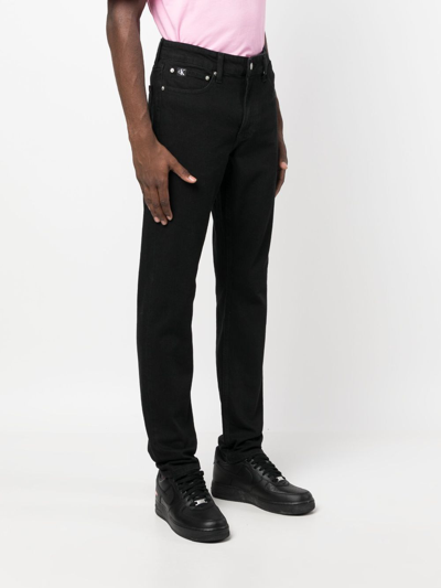 Shop Calvin Klein Jeans Est.1978 Mid-rise Slim-cut Jeans In Black