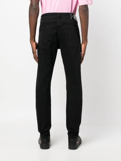Shop Calvin Klein Jeans Est.1978 Mid-rise Slim-cut Jeans In Black