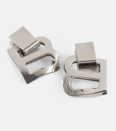 Shop Balenciaga Hourglass Crash Medium Earrings In Silver