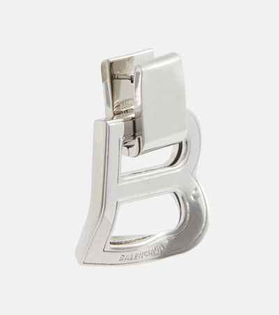 Shop Balenciaga Hourglass Crash Medium Earrings In Silver