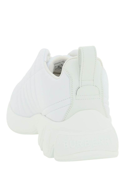 Shop Burberry Quilted Leather Sneakers In White