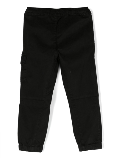 C.p. Company Logo-plaque Cotton Track Pants In Black