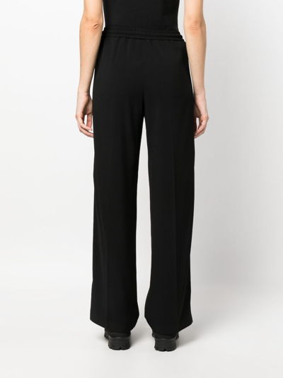 Shop Moncler Straight-leg Drawstring Trousers In Black