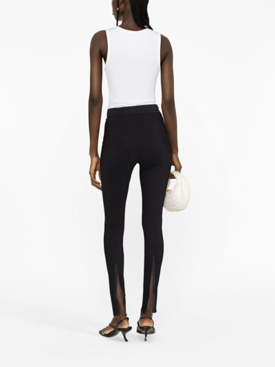 Shop Wardrobe.nyc Elasticated-waist Rear-slit Leggings In Black