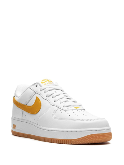 Shop Nike Air Force 1 Low Waterproof "university Gold" Sneakers In White