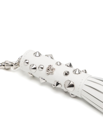 Shop Versace Studded Tassel Keychain In White