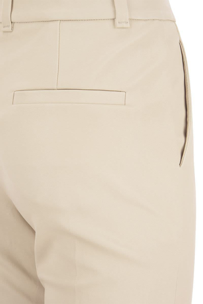 Shop Brunello Cucinelli Stretch Nappa Leather Cigarette Trousers In Ivory