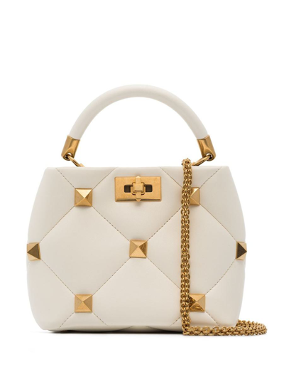 Shop Valentino Garavani Roman Stud Small Leather Handbag In White