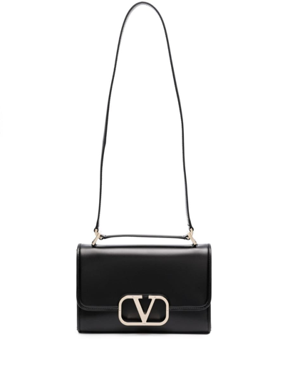 Shop Valentino Garavani Vlogo Type Leather Shoulder Bag In Black