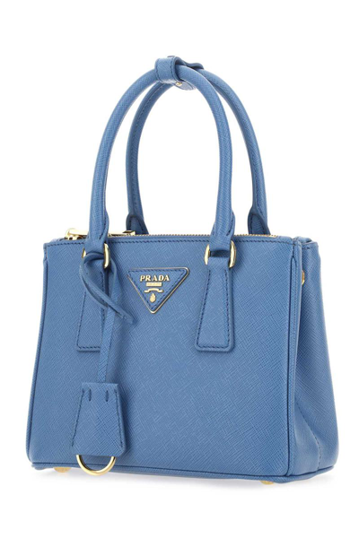 Shop Prada Handbags. In Light Blue