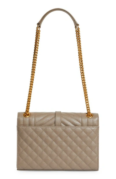 Shop Saint Laurent Medium Cassandra Quilted Leather Envelope Bag In Greyish Brown