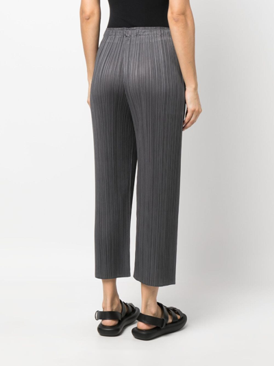 Shop Issey Miyake Plissé-effect Cropped Trousers In Grey