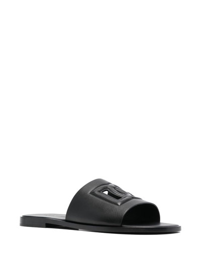 Shop Dolce & Gabbana Embossed-logo Leather Slides In Schwarz