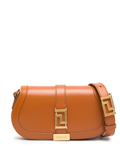 Shop Versace Mini Greca Goddess Leather Shoulder Bag In Braun