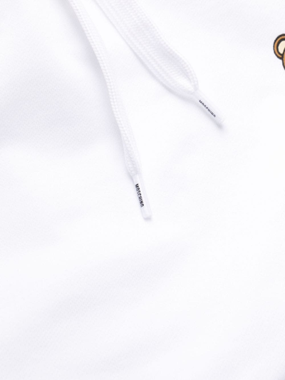 Shop Moschino Logo-print Drawstring Hoodie In White