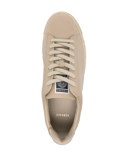 Shop Versace La Greca Low-top Sneakers In Brown