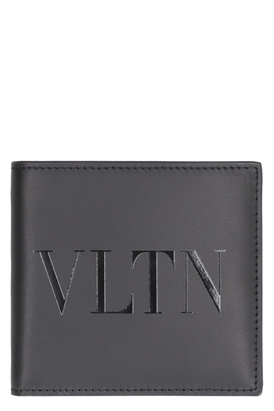 Shop Valentino Garavani - Vltn Leather Flap-over Wallet In Black
