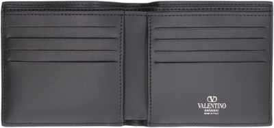 Shop Valentino Garavani - Vltn Leather Flap-over Wallet In Black