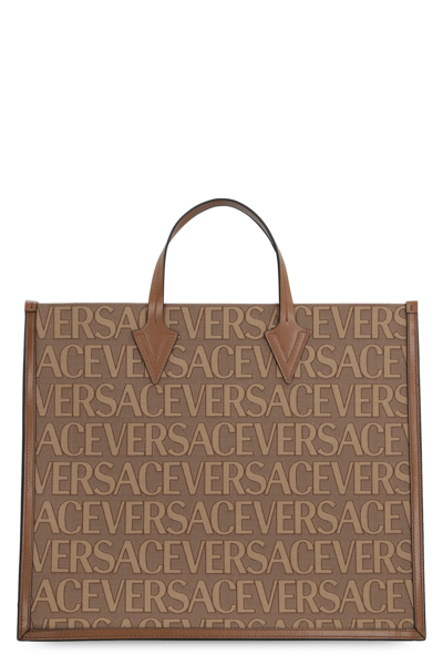 Shop Versace Canvas And Leather Shopping Bag In Beige