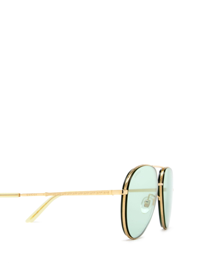 Shop Gucci Gg0356s Gold Sunglasses