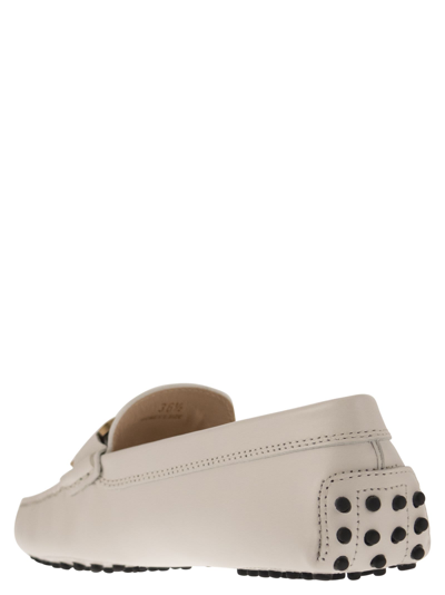 Shop Tod's Moccasin With Metal Chain In Ivory