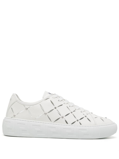 Shop Versace Slashed Leather Sneakers In White