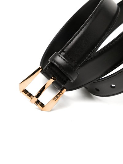 Versace Logo-engraved Leather Belt In Black