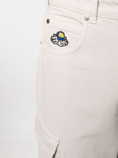 Shop Msgm Logo-patch Cargo Jeans In Neutrals