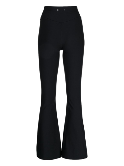 Shop The Upside Peached Florence Flared Leggings In Black