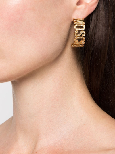 Shop Moschino Rhinestone-embellished Half-hoop Earrings In Gold