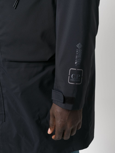 C.p. Company Logo-print Layered Coat In Blue