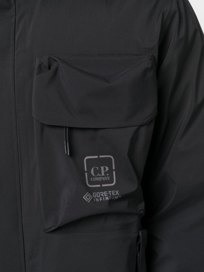 Shop C.p. Company Logo-print Two-pocket Windbreaker In Schwarz