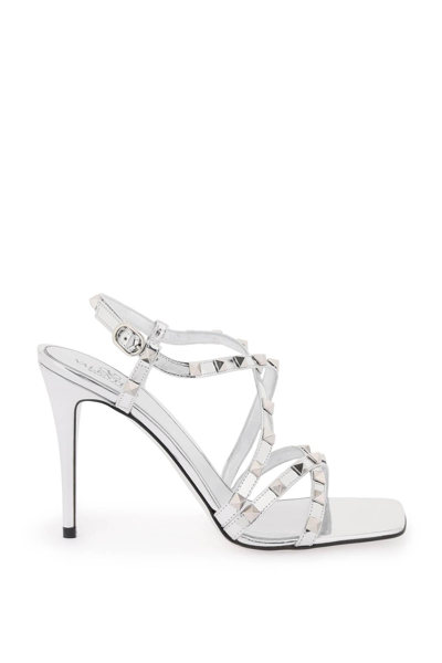 Shop Valentino Laminated Leather Rockstud Sandals In Metallic,silver