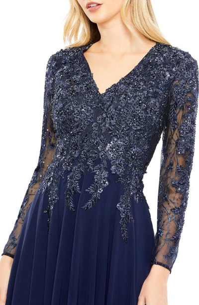 Shop Mac Duggal Beaded Bodice Long Sleeve A-line Gown In Navy