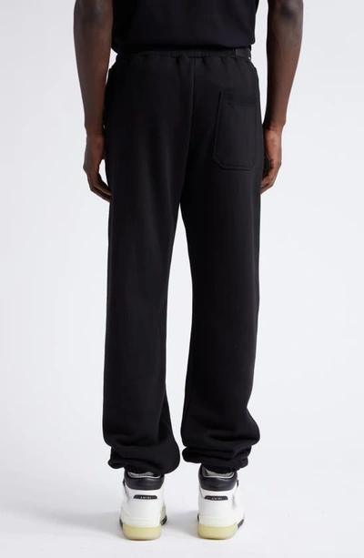 Amiri Logo Printed Drawstring Sweatpants In Black