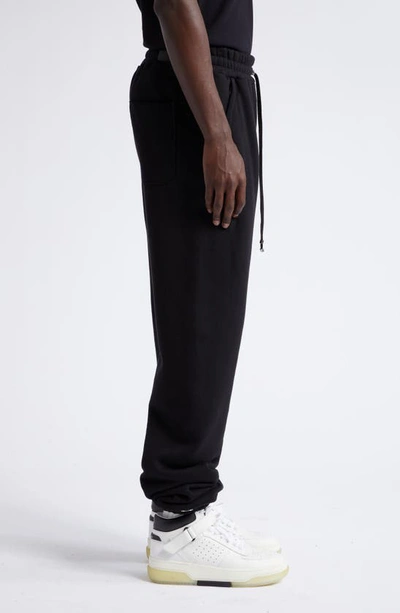 Amiri Logo Printed Drawstring Sweatpants In Black