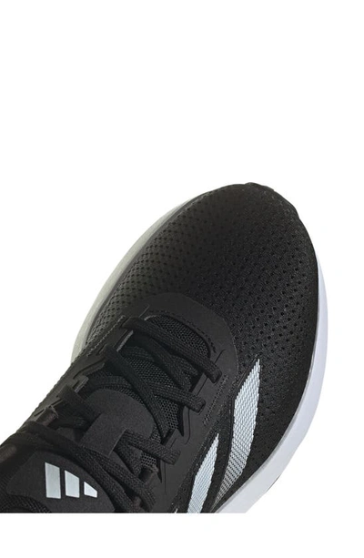 Shop Adidas Originals Duramo Sl Running Shoe In Black/ White/ Carbon