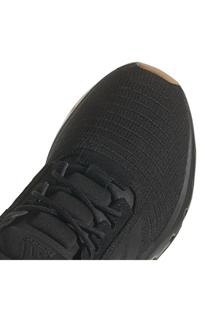 Shop Adidas Originals Swift Run 23 Running Shoe In Black/ Black/ Gum